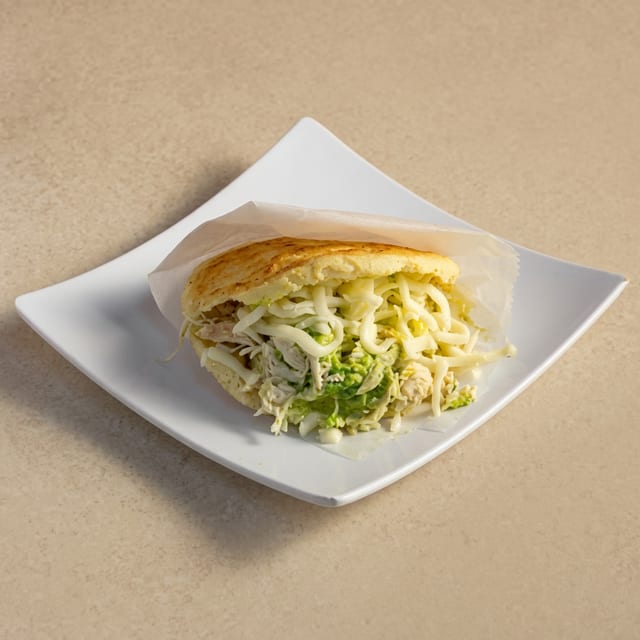 Arepa Reina Pepiada (Chicken and Avocado Cornmeal Sandwich).