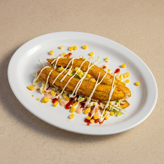 Patacón de Pollo Maduro (Chicken Sweet Plantain Sandwich).