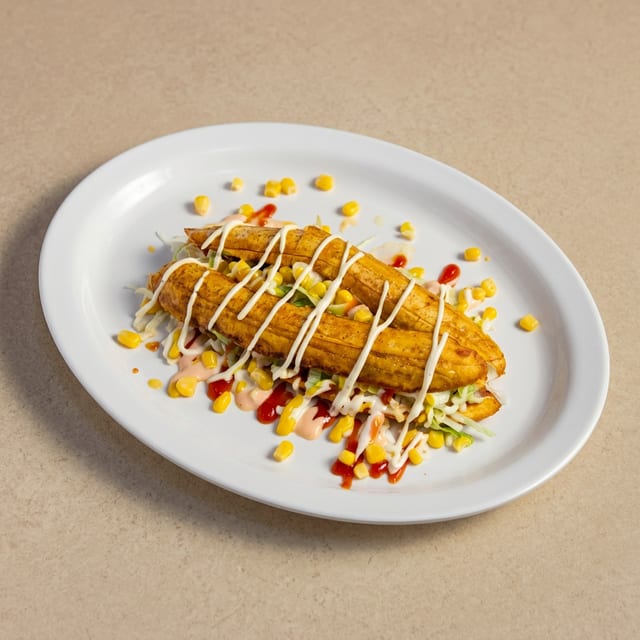 Patacón de Carne Maduro (Beef Sweet Plantain Sandwich).