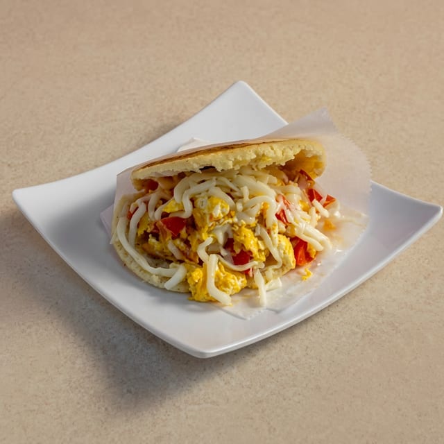 Arepa Perico (Scrambled Egg Cornmeal Sandwich).